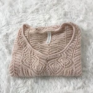 light pink sweater